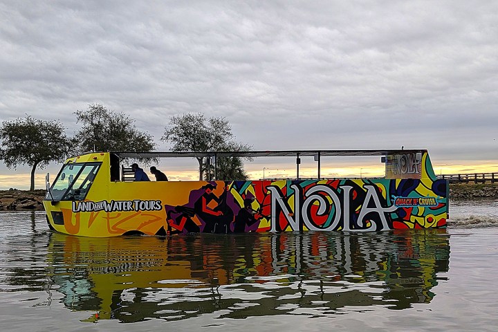 a group of people on a boat in the water
