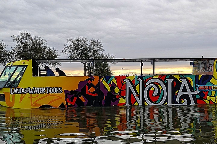a group of people on a boat in the water