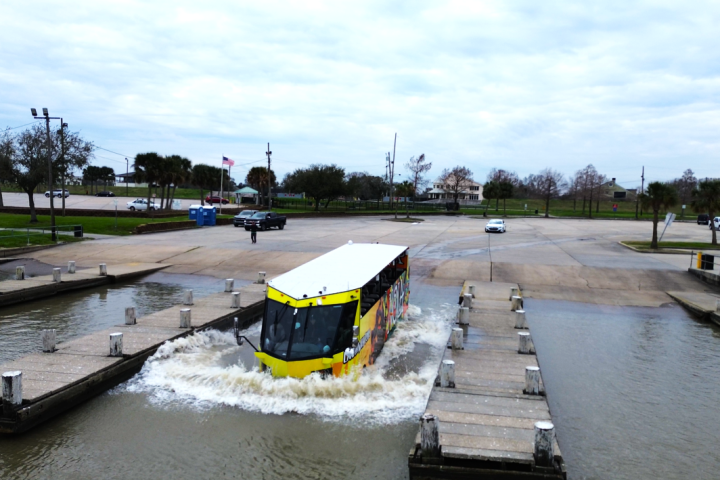 a small boat in a parking lot