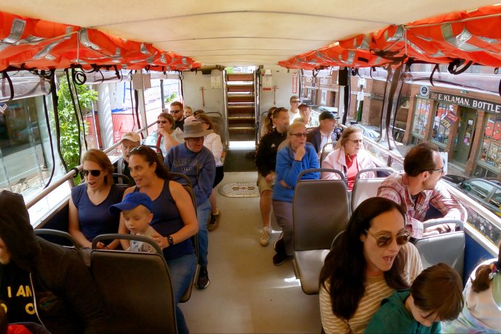 a group of people standing in front of a store